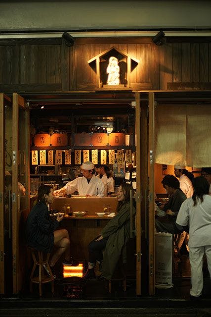 A cozy izakaya (traditional Japanese bar). Photo by Kris Sevinc on Unsplash