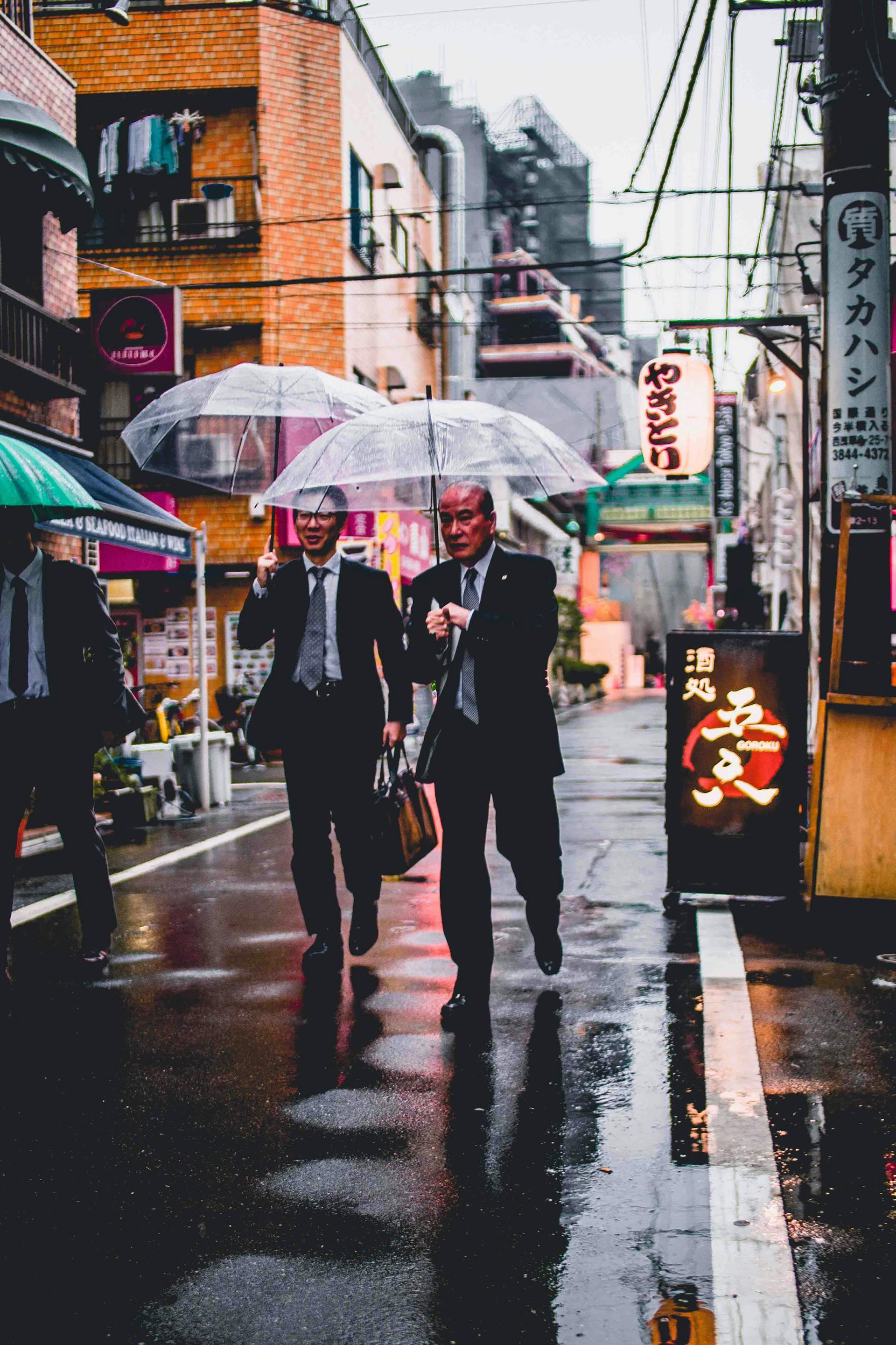 Japanese "salarymen", which represent Japanese workplace culture. Photo source: Redd F (Unsplash)